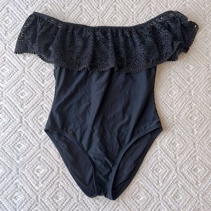 Women’s black off the shoulder one piece swimsuit with lace detail, size Medium